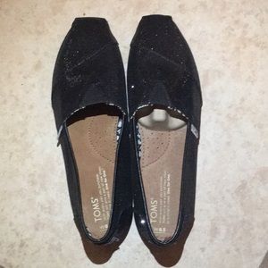 A brand new toms shoes black/shine